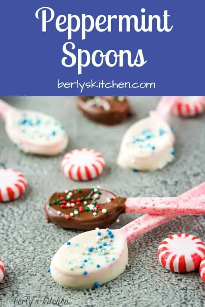 The chocolate dipped peppermint spoons surrounded by round peppermint candies.