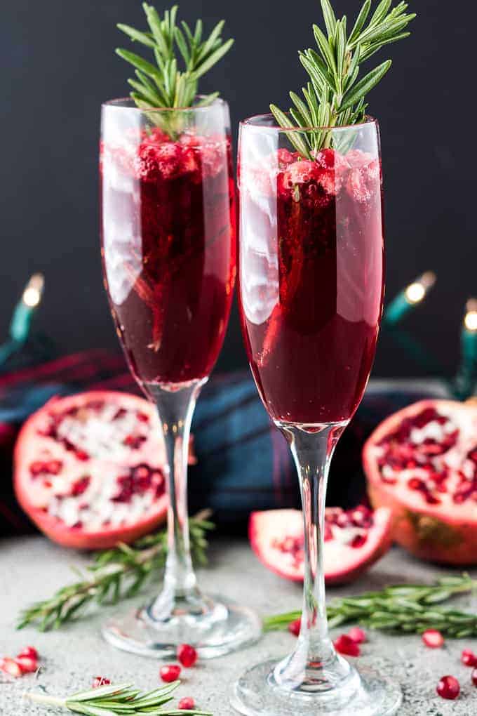 The cocktails are finished and garnished with fresh rosemary for color.