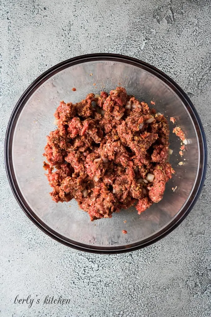 The ground beef and other ingredients have been properly combined.