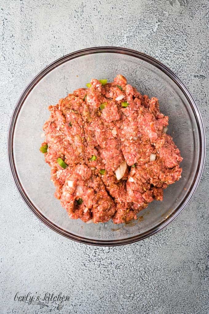 The meatloaf ingredients have been combined in the mixing bowl.
