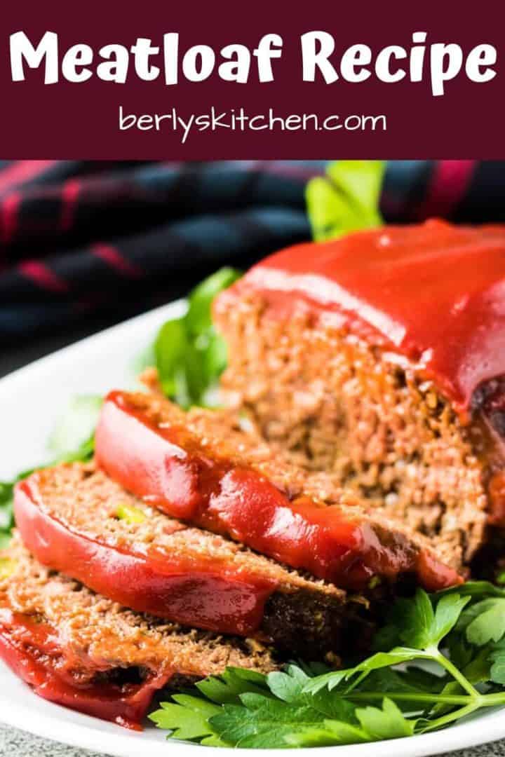 The finished meatloaf has been topped with ketchup and sliced.