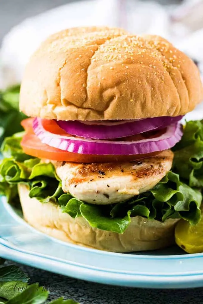 A close-up of the grilled chicken sandwich on a bun.