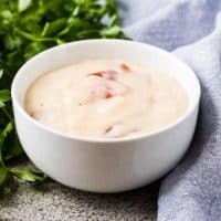 The cream of bacon soup substitute in small white bowl.