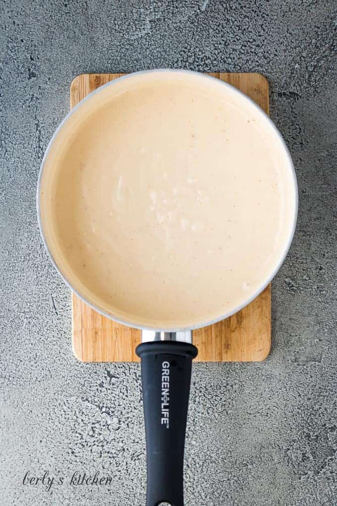 The milk and flour mixture added to the hot broth.