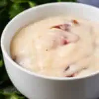 A close-up of the soup showing the bacon pieces.