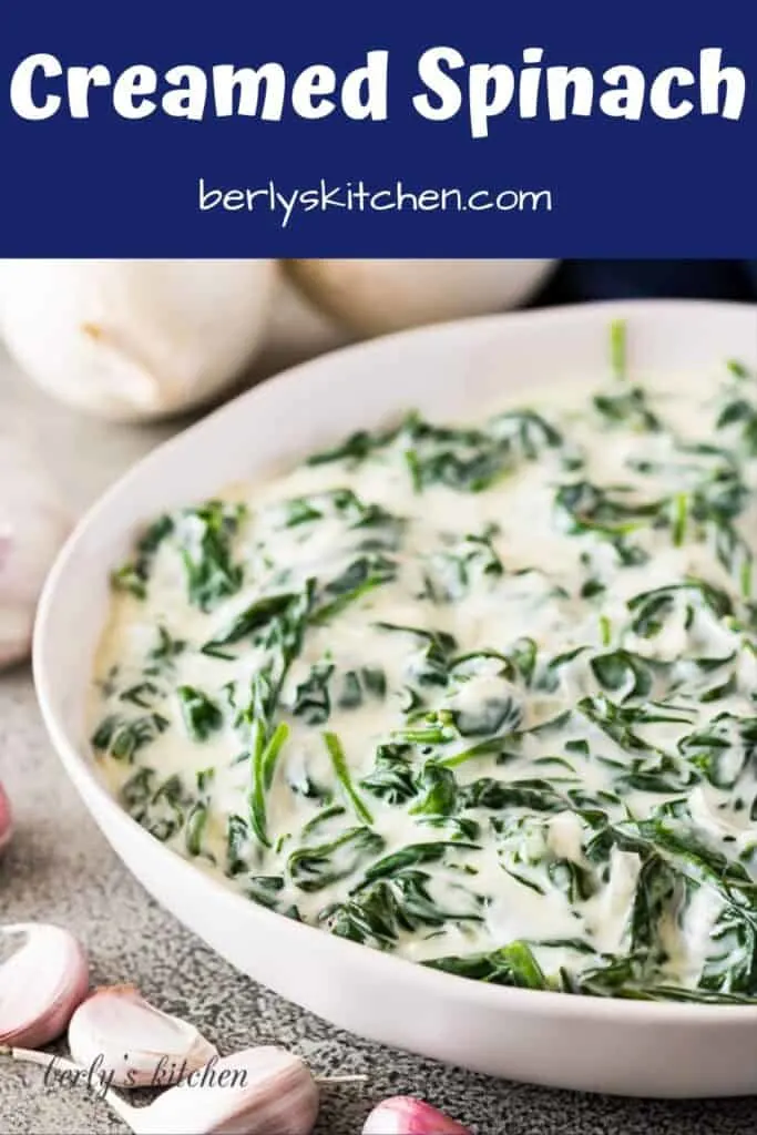 The finished creamed spinach recipe served in a large bowl.