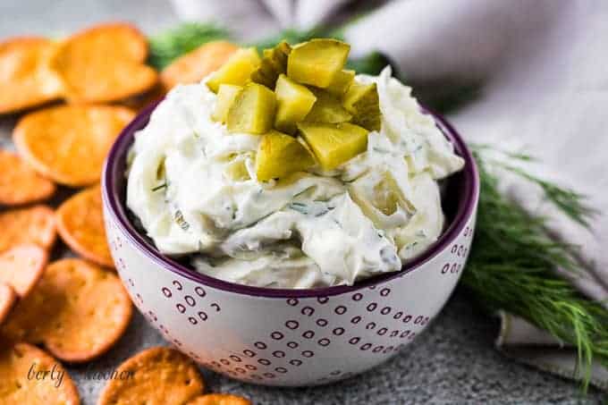 The crunchy dill pickle dip served in a decorative bowl.