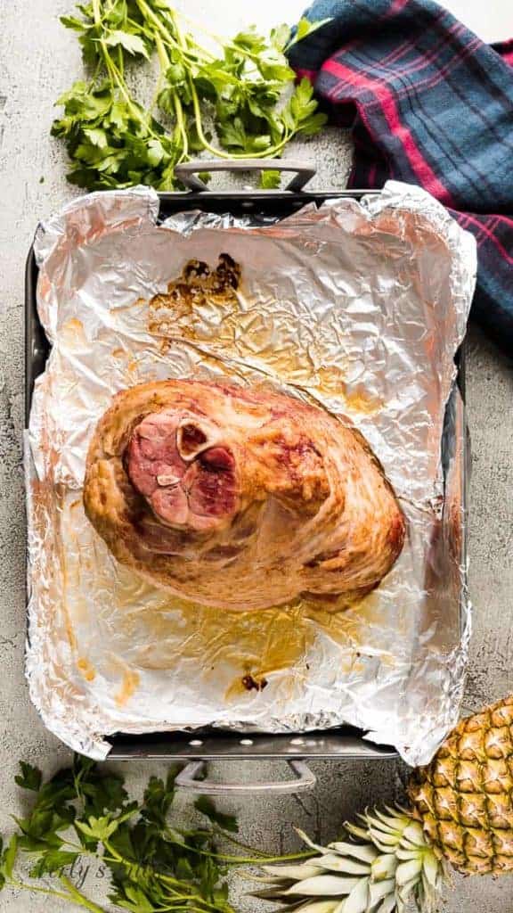 The ham has been drizzled with the brown sugar glaze.