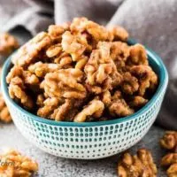 The maple glazed candied walnuts in a small decorative bowl.