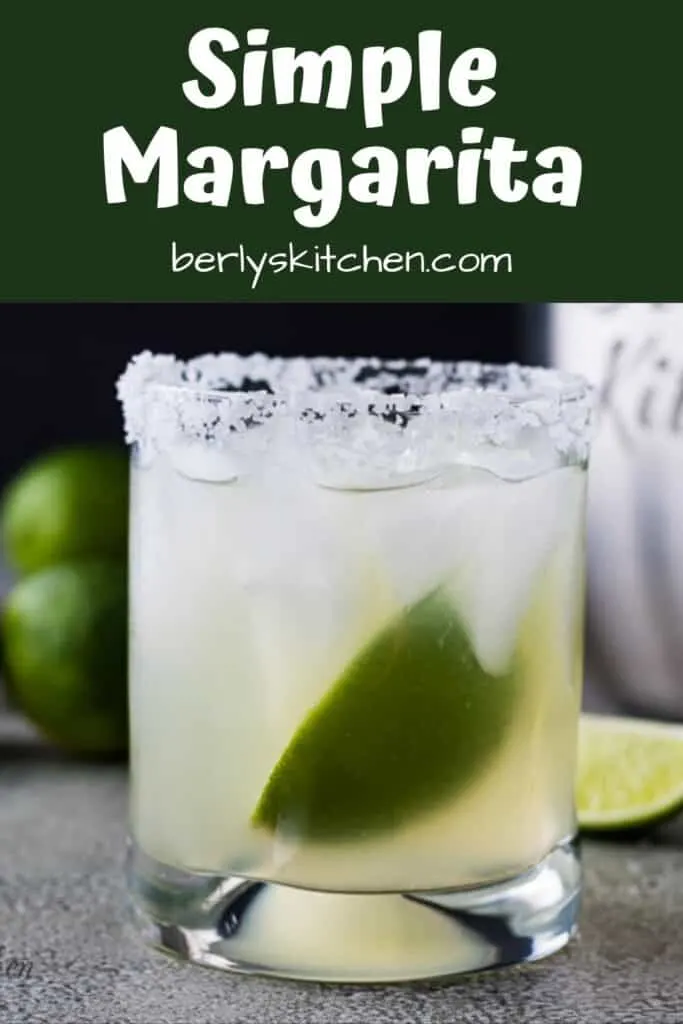 The finished simple margarita recipe served with ice and lime.