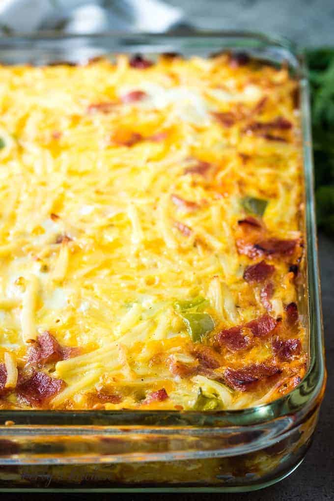 The baked cheesy breakfast casserole in a pan.