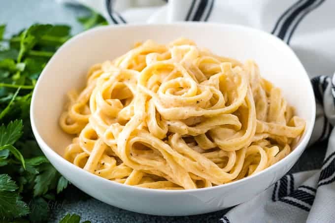 The spicy fettuccine Alfredo served in a pasta bowl.