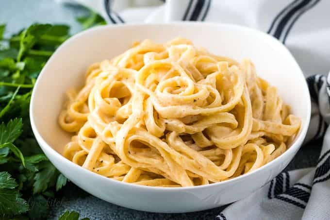 The spicy fettuccine alfredo served in a pasta bowl.