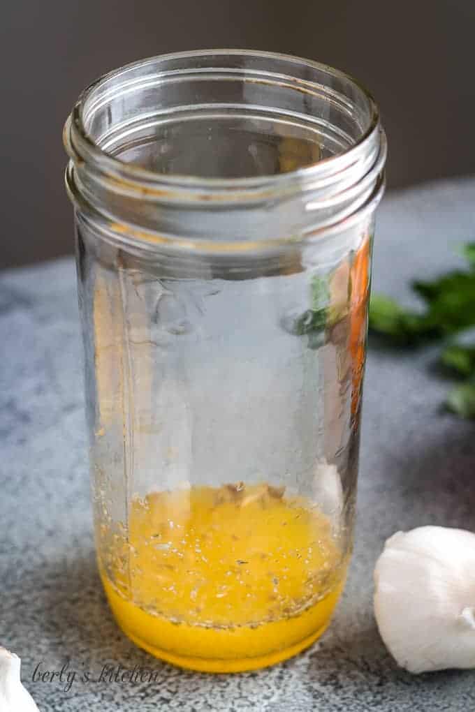 Fresh squeezed lemon and orange juice in a mason jar.