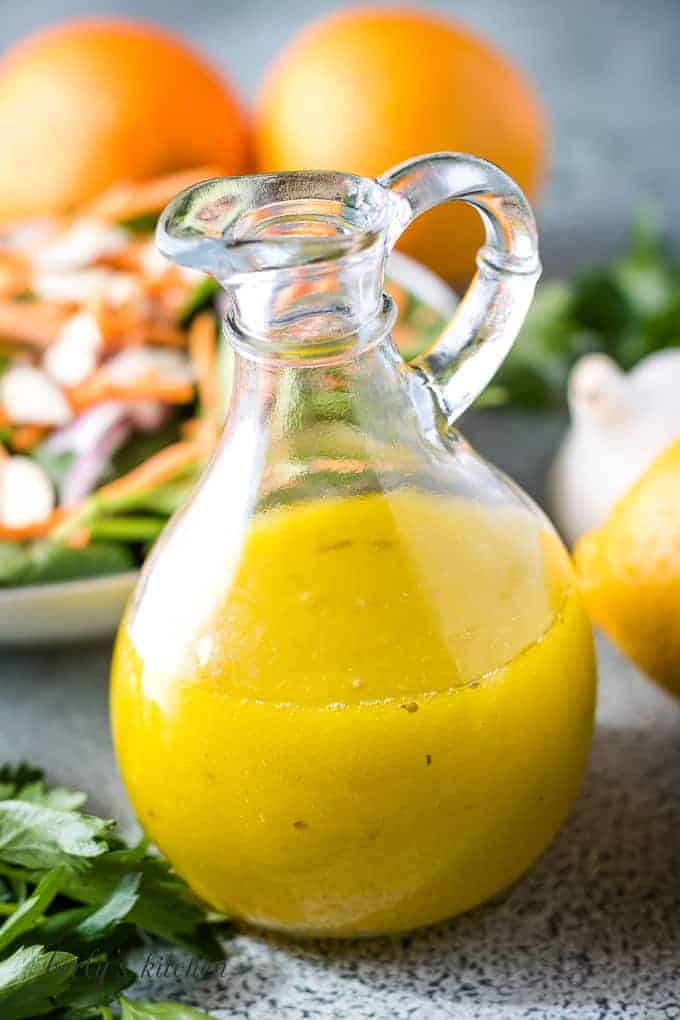 The orange citrus salad dressing served with a salad.