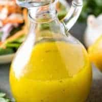A close-up of the salad dressing in a bottle.