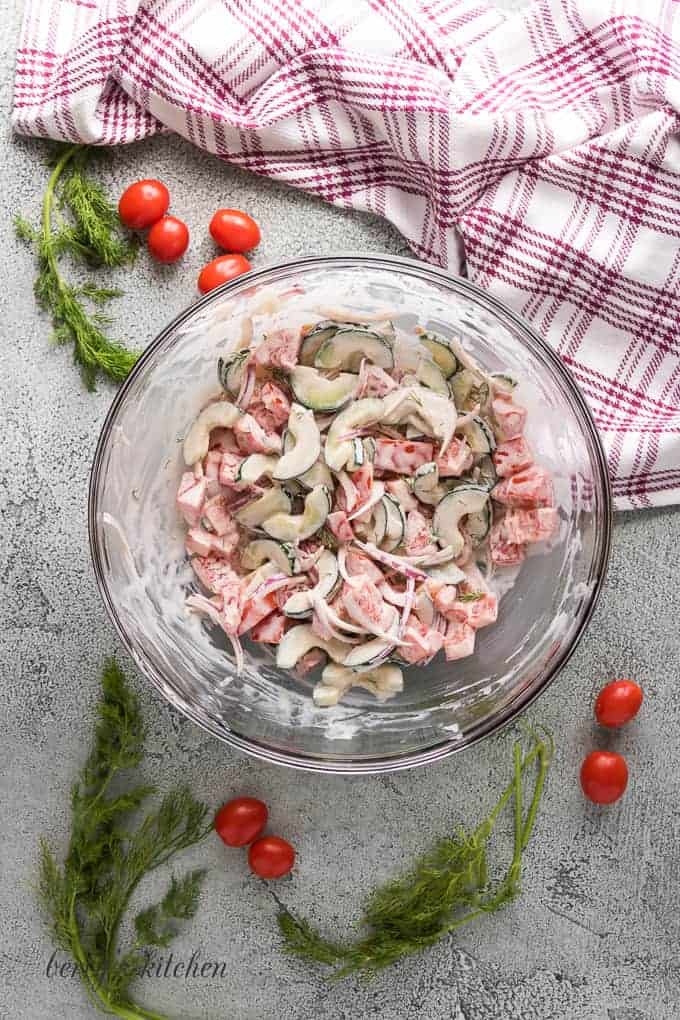 The dill sauce and vegetables have been tossed together.
