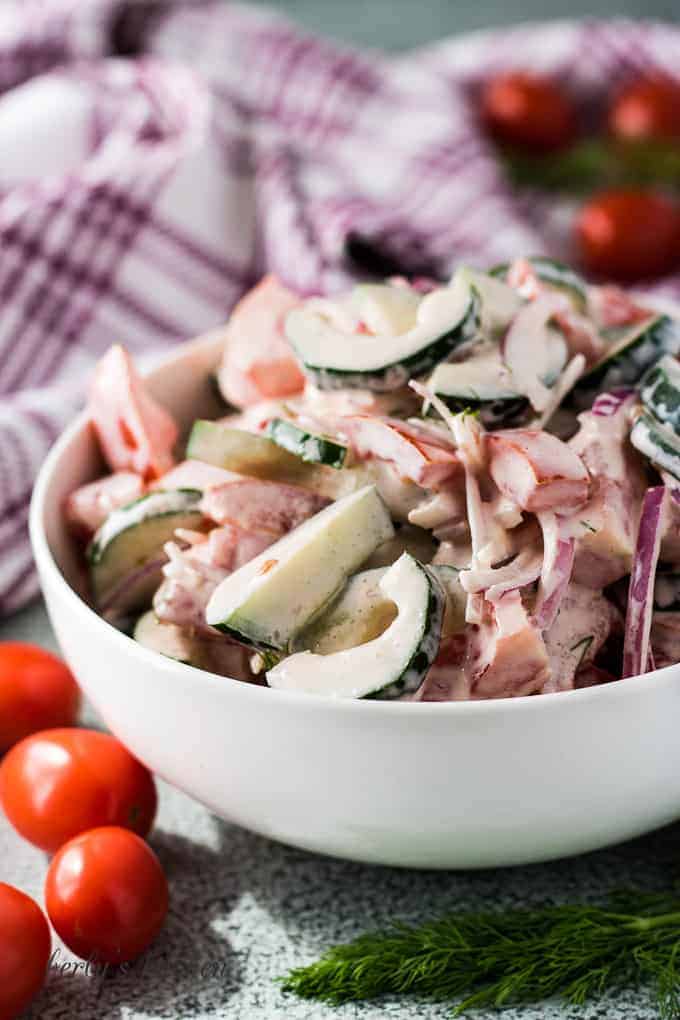 The finished salad with fresh grape tomatoes.