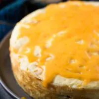 The Instant Pot frittata topped with melted cheddar cheese.