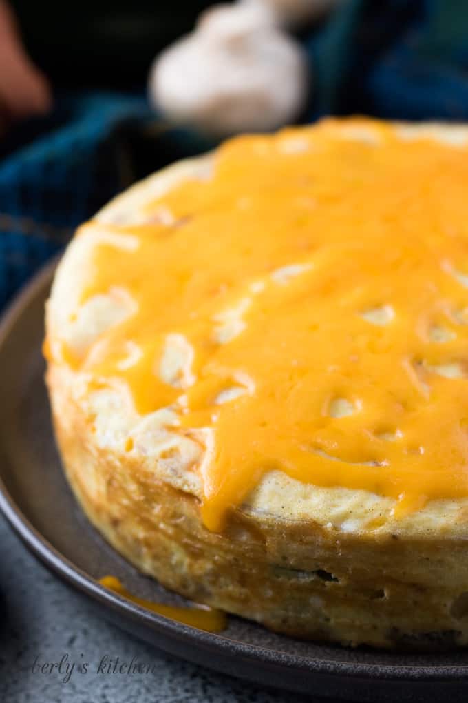 The Instant Pot frittata topped with melted cheddar cheese.