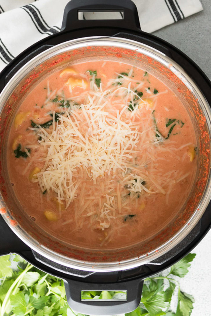 Shredded Parmesan cheese stirred into the soup.