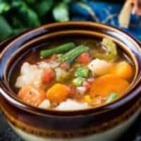 The finished instant pot veggie soup in a bowl.