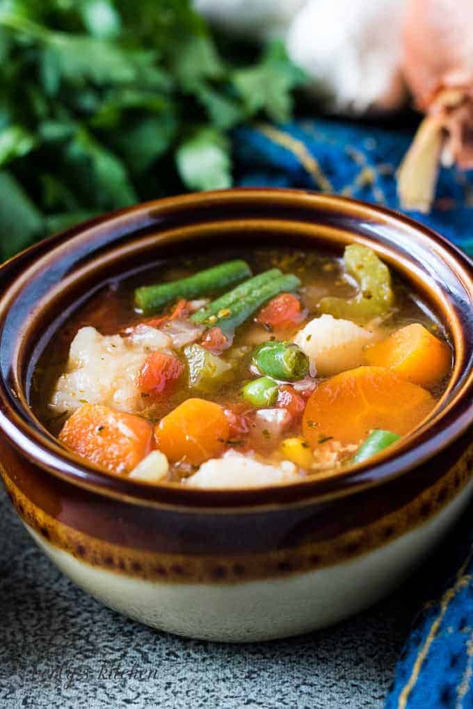 The finished instant pot veggie soup in a bowl.