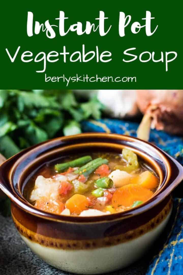 A brown and white ceramic bowl full of instant pot vegetable soup.