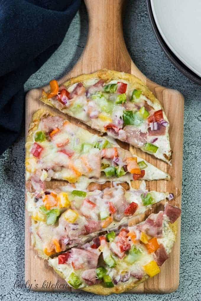 The flatbread appetizer has been cut into four slices.