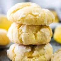 A close-up of three stacked crinkle cookies.