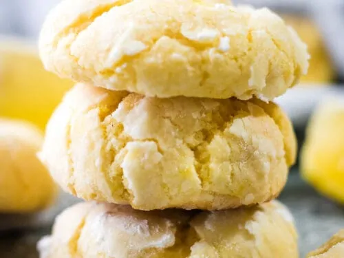A close-up of three stacked crinkle cookies.