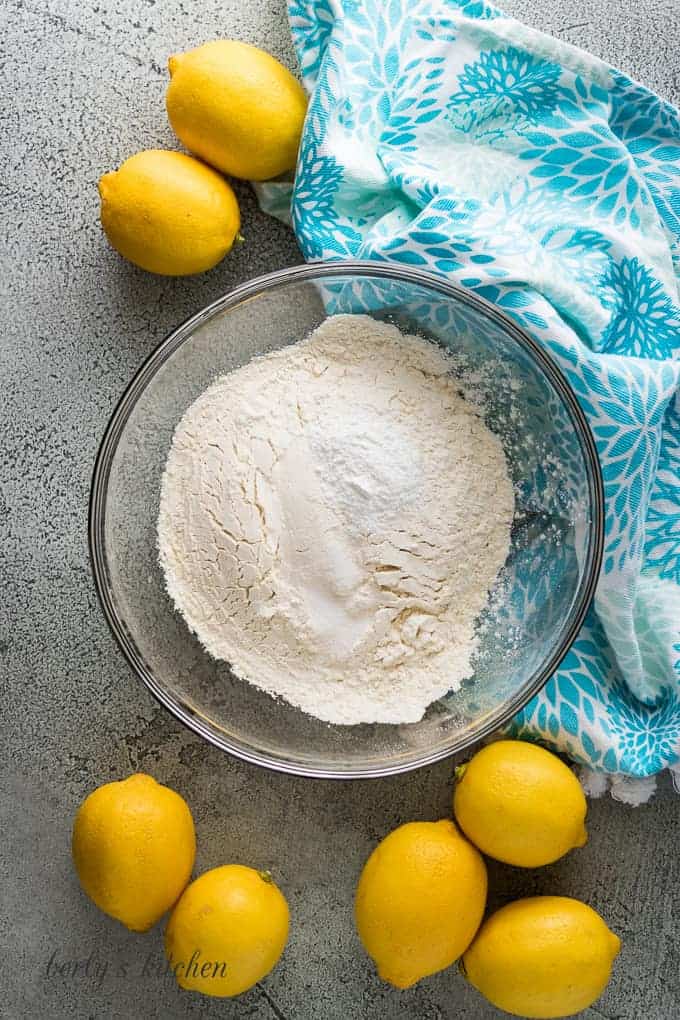 Flour, baking powder, and salt in a mixing bowl.