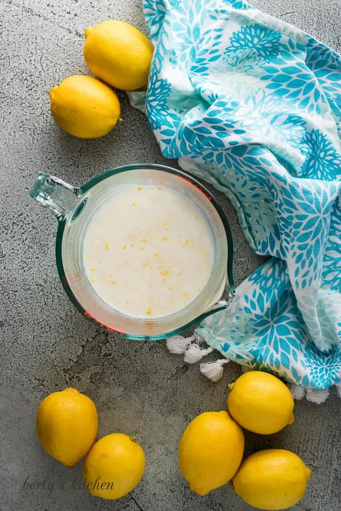 Buttermilk, lemon juice, and zest in a measuring cup.