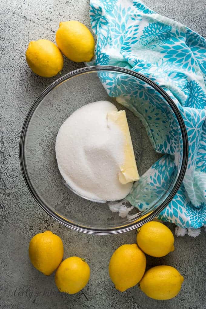 Butter and sugar in a separate large mixing bowl.