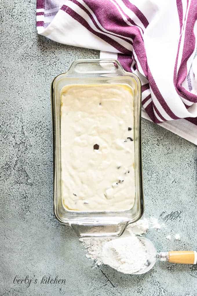 The chocolate chip loaf batter poured into the loaf pan.