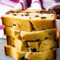 A stack of four slices of the finished loaf cake.