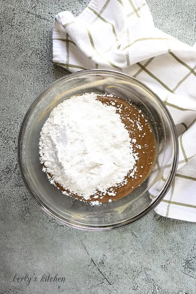 Powdered sugar has been added to the butter and peanut butter mixture.
