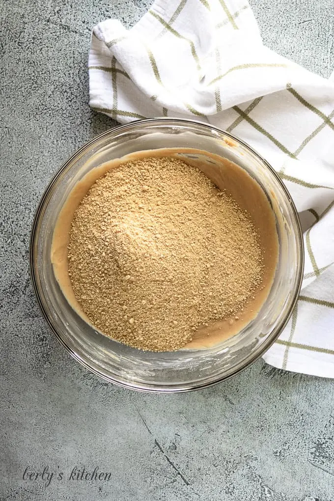 Graham cracker crumbs have been added to the filling mixture.