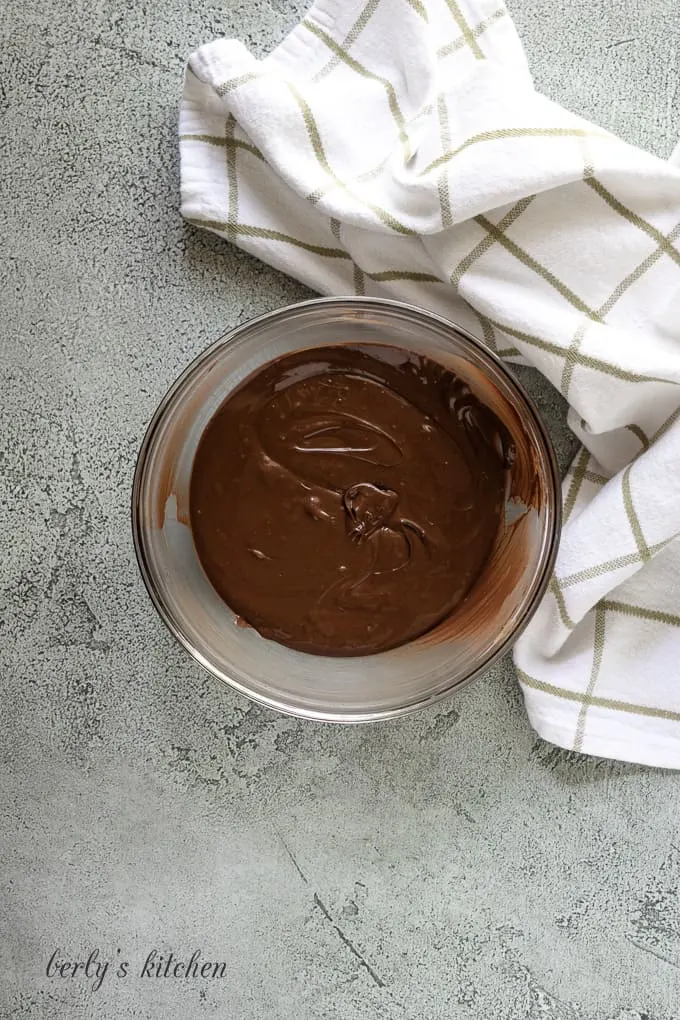 The chocolate topping mixture has been melted and combined.