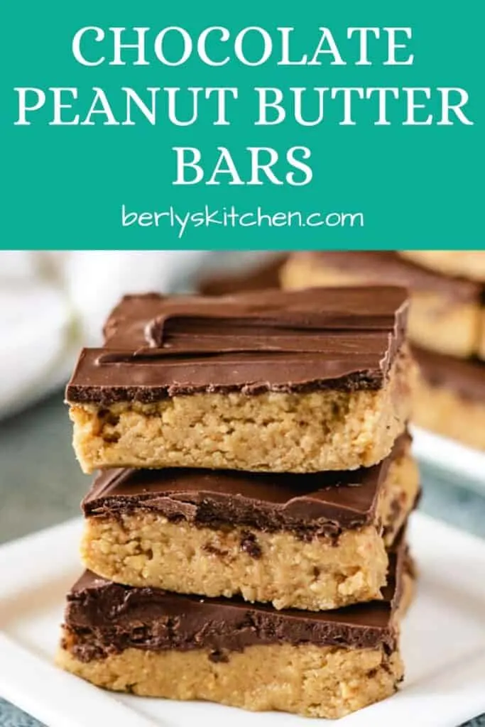 Three squares of the chocolate peanut butter bars on a plate.