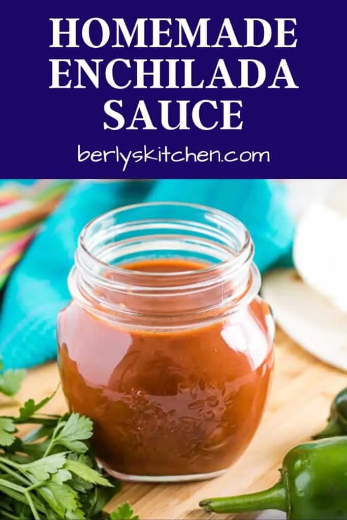 Homemade red enchilada sauce in a small container.