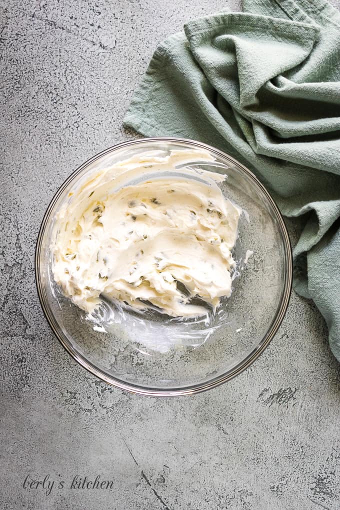 The cream cheese and other ingredients have been combined to make a filling.