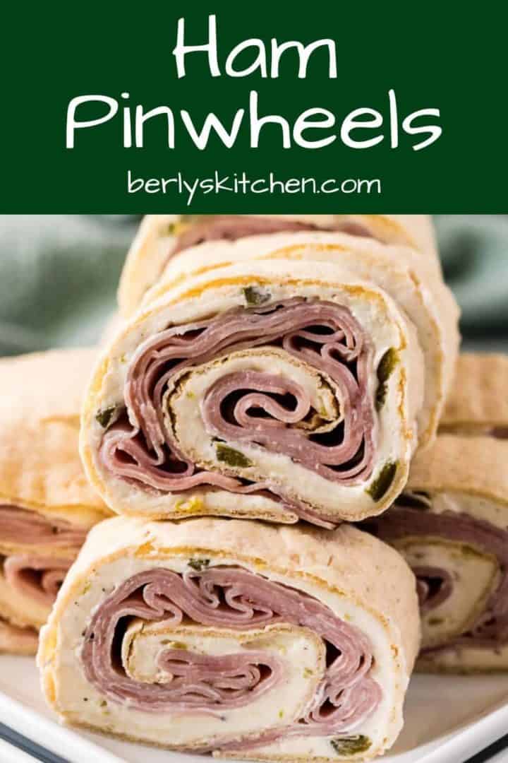 A stack of the ham and cream cheese pinwheels on a plate.