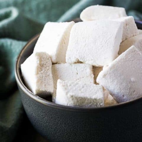 The square marshmallows served in a bowl.
