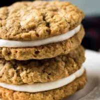 A close-up of the cookie sandwiches on a plate.