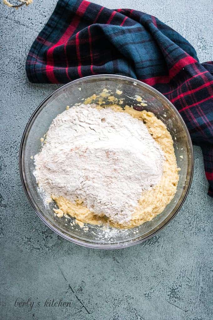 The flour mixture dumped into the butter sugar mixture.