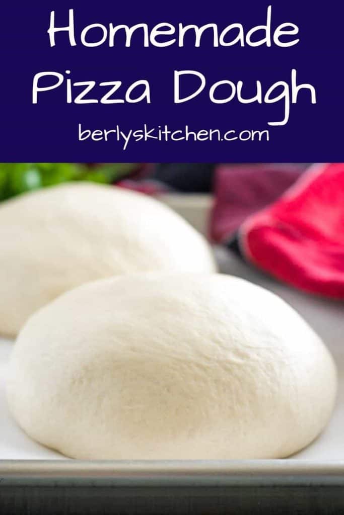 Two balls of homemade publix pizza dough on a pan.