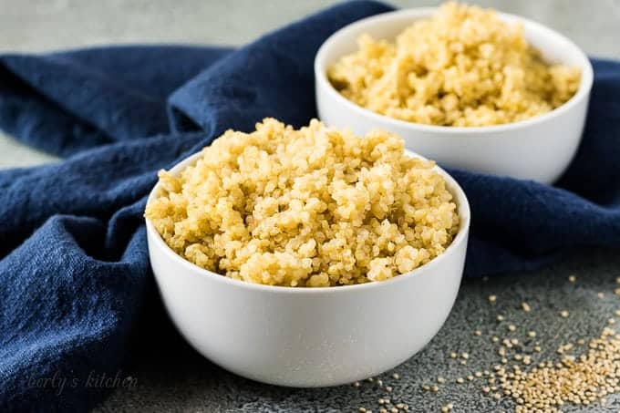 Two white bowls of Instant Pot quinoa.