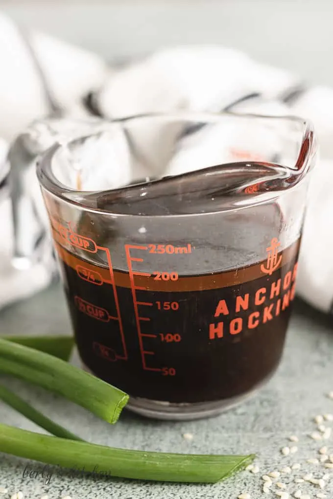 Soy sauce and other ingredients in a measuring cup.