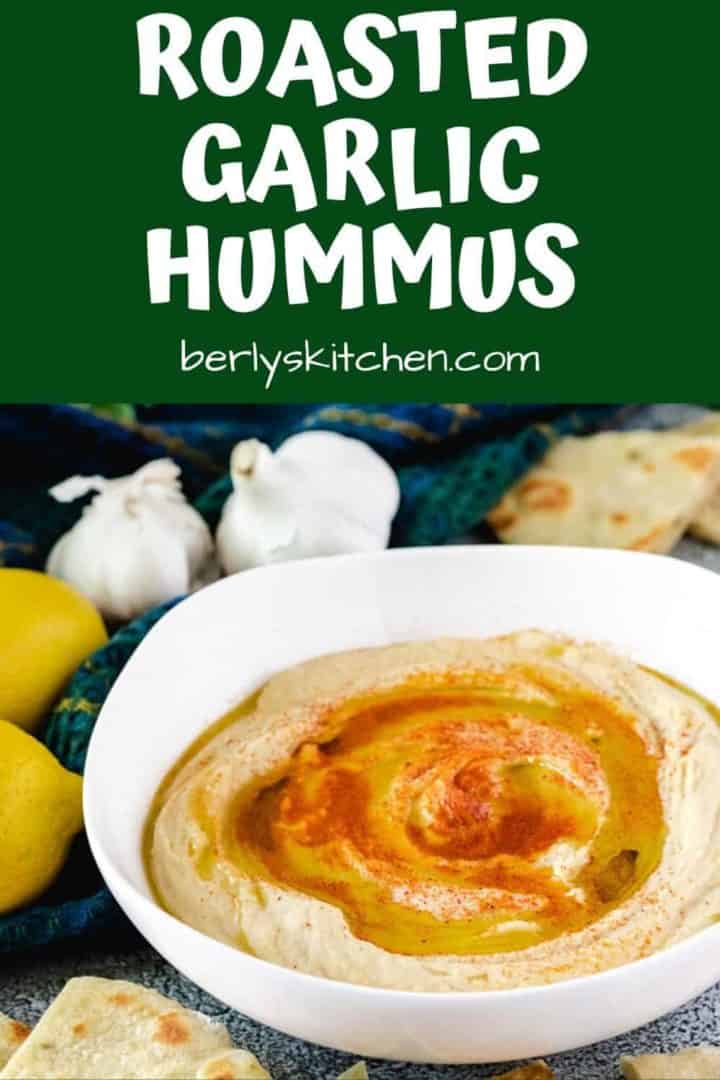 The roasted garlic hummus recipe served in a white bowl.